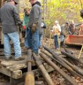 Examining some of the material removed from the well.