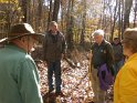 Rob Greathouse discussing the well plugging process with well hunters.