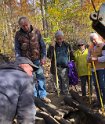 Well hunters getting information on the fishing tool used to clean out a well.