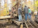 Preparing to drop the fishing tools into the well.